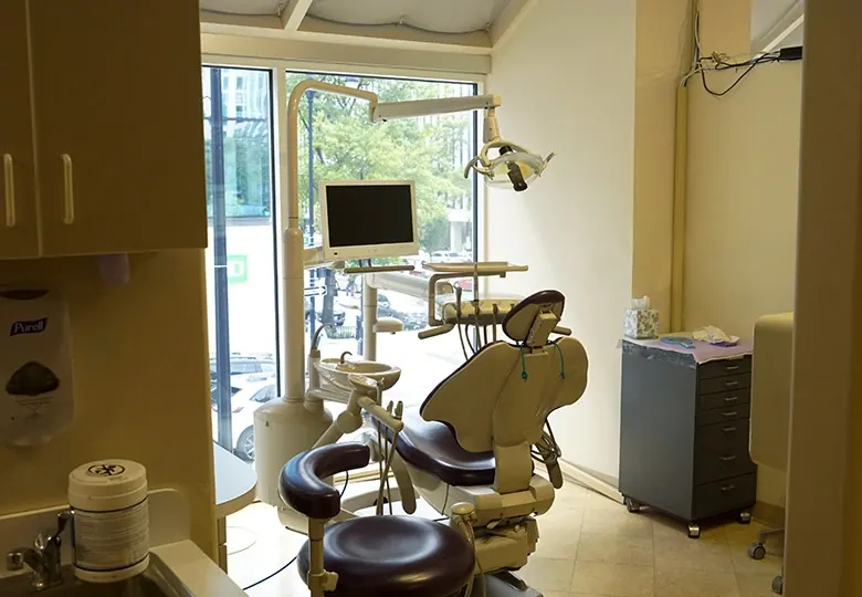 A treatment room at Davidson Dental Associates, with the chair by a tall window.